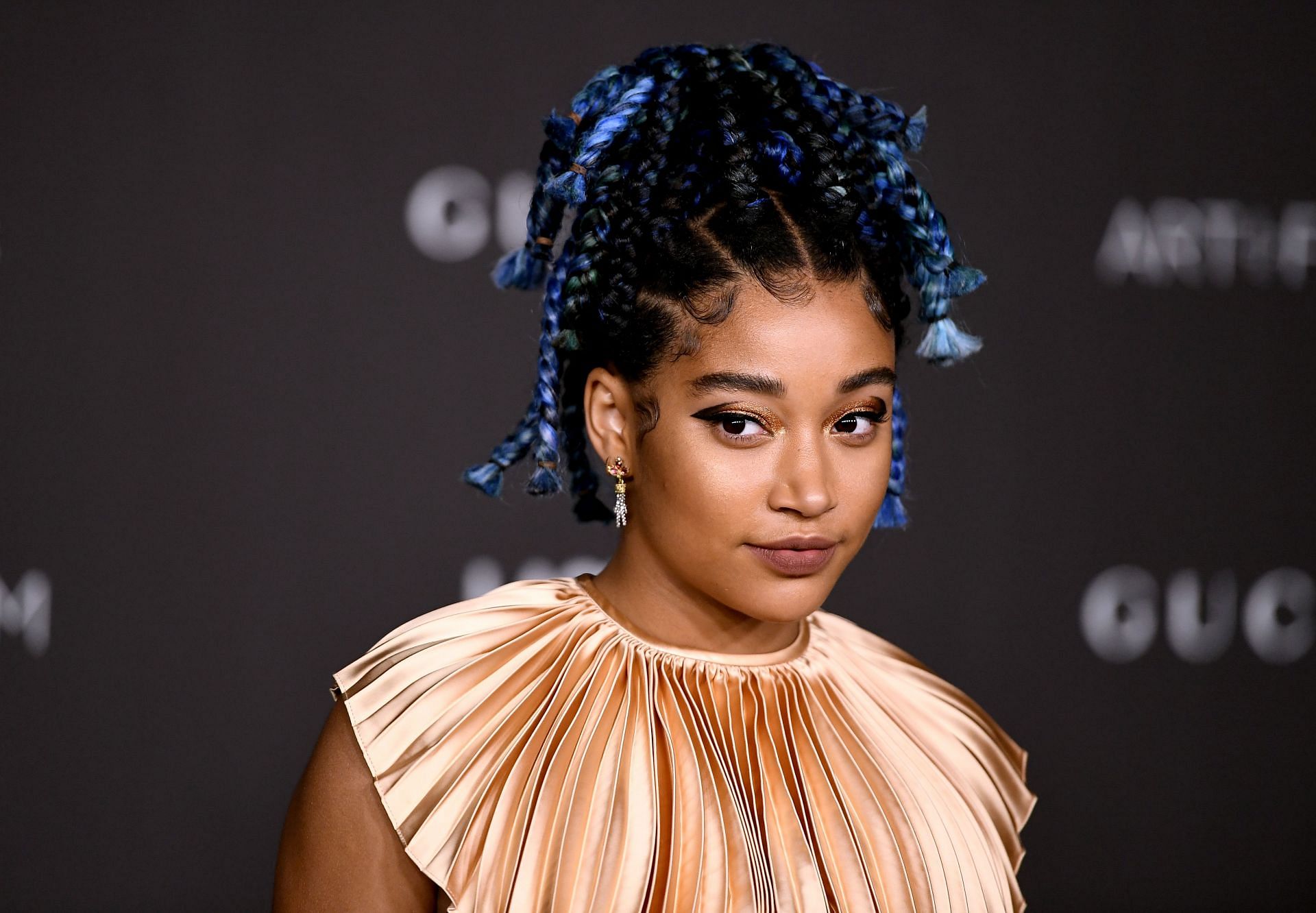 Amandla Stenberg stars as Rue (Image via Getty)